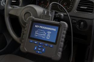 Car key programming device connected to a vehicle in Stockport